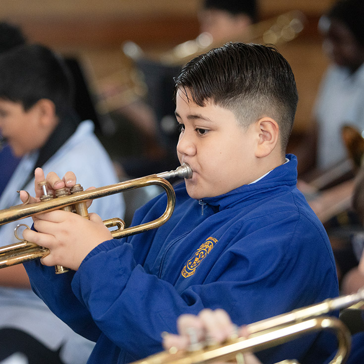 St Bernadette's Catholic Primary School Lalor Park student playing trumpet in school band